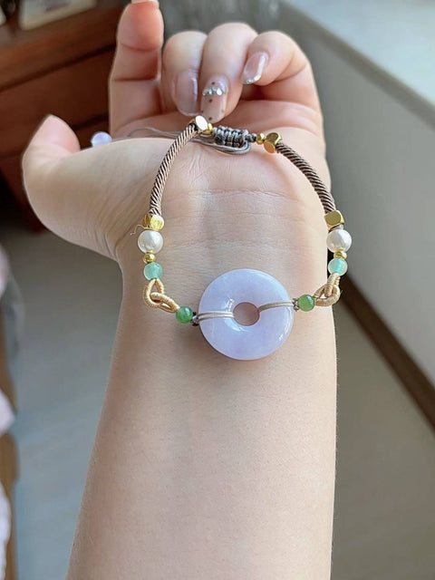 Gelang giok alami, warna ungu yang indah, terlihat menawan saat dikenakan, harga sangat terjangkau, ukuran 2.2, sudah termasuk ongkos kirim dan pajak.