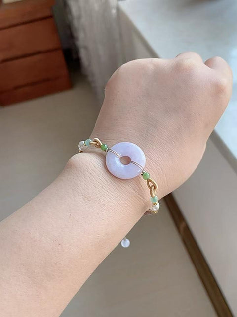 Gelang giok alami, warna ungu yang indah, terlihat menawan saat dikenakan, harga sangat terjangkau, ukuran 2.2, sudah termasuk ongkos kirim dan pajak.