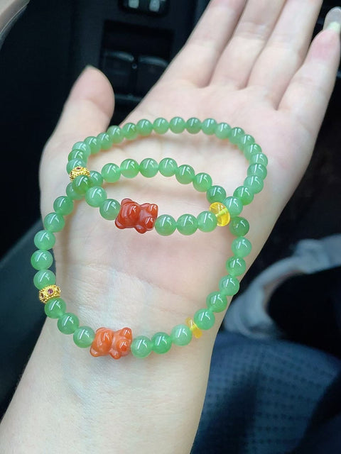 Gelang giok nefrit alami, terbuat dari material tambang lama, sangat tembus cahaya, bersih dan jernih, dipadukan dengan batu akik merah, diameter 6mm, termasuk ongkos kirim dan pajak.