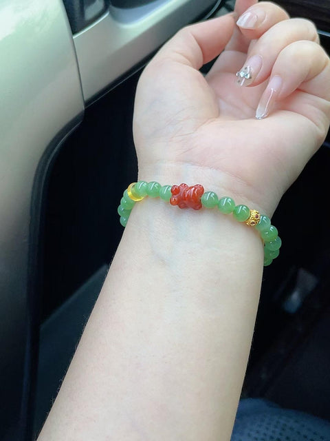 Gelang giok nefrit alami, terbuat dari material tambang lama, sangat tembus cahaya, bersih dan jernih, dipadukan dengan batu akik merah, diameter 6mm, termasuk ongkos kirim dan pajak.