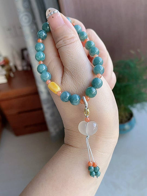 Gelang giok alami, material tambang lama, dipadukan dengan akik merah, amber, dan kalsedon. Diameter 8 mm. Harga sudah termasuk ongkos kirim dan pajak.