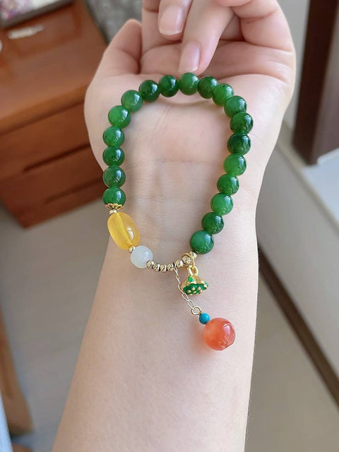 Gelang giok alami, dipadukan dengan amber dan akik merah, diameter 8mm, harga sudah termasuk ongkos kirim dan pajak.