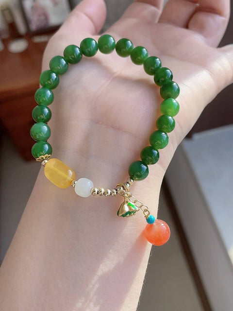 Gelang giok alami, dipadukan dengan amber dan akik merah, diameter 8mm, harga sudah termasuk ongkos kirim dan pajak.