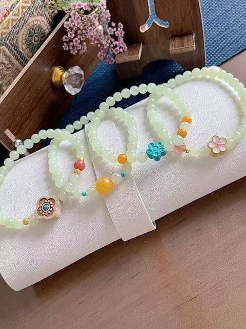 Gelang giok Hetian alami, menampilkan amber, akik merah, dan berlian hijau. Nilai yang bagus untuk hadiah atau sebagai kenang-kenangan pribadi. Ukuran: 0,6. Termasuk ongkos kirim dan pajak.