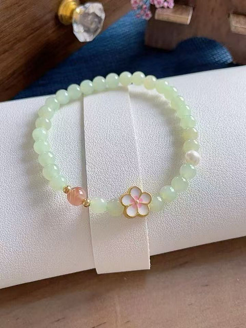 Gelang giok Hetian alami, menampilkan amber, akik merah, dan berlian hijau. Nilai yang bagus untuk hadiah atau sebagai kenang-kenangan pribadi. Ukuran: 0,6. Termasuk ongkos kirim dan pajak.