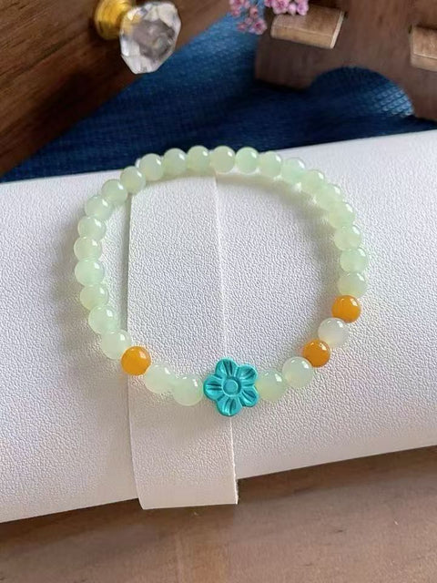 Gelang giok Hetian alami, menampilkan amber, akik merah, dan berlian hijau. Nilai yang bagus untuk hadiah atau sebagai kenang-kenangan pribadi. Ukuran: 0,6. Termasuk ongkos kirim dan pajak.