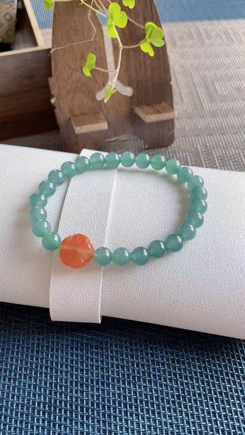 Gelang giok alami, material tambang lama, tekstur halus dan hangat, warna biru kehijauan yang indah, dipadukan dengan akik merah, ukuran 0.8, termasuk ongkos kirim dan pajak.