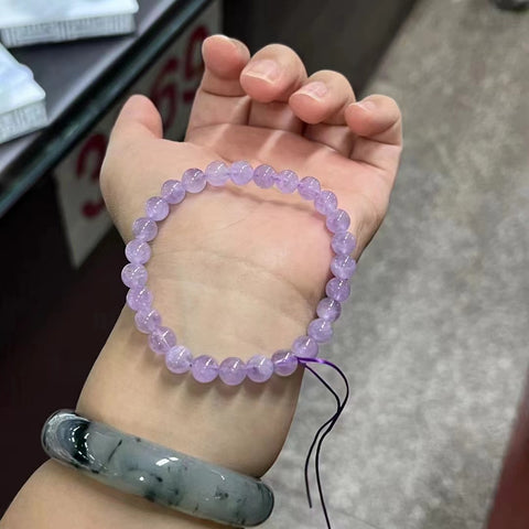 Gelang Kecubung Lavender Alami Ukuran 7mm Sudah termasuk pajak pengiriman.