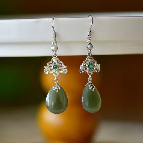 2885Q Anting Mutiara Giok Hetian Giok Alami Ukuran 16 * 20mm Giok halus dan hangat, dan gayanya indah.