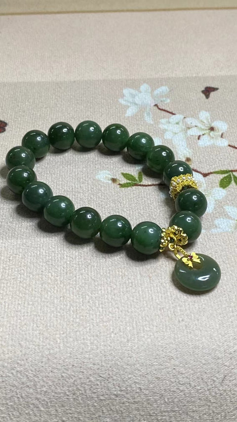 Gelang Jasper alami dengan aksesoris yang indah Sedikit bercak tinta Ukuran 12mm Sudah termasuk pajak pengiriman.