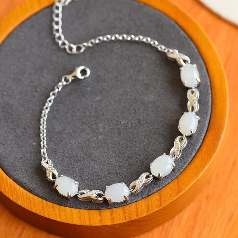 Gelang Giok Hetian Giok alami yang bersih dan halus, terbuat dari perak 925, gaya baru, ukuran 6 * 8mm, termasuk pajak pengiriman.