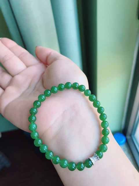 Gelang Jasper Alami dengan Giok Perak 925 yang bersih, halus dan hangat Ukuran 6mm Sudah termasuk ongkos kirim dan pajak.
