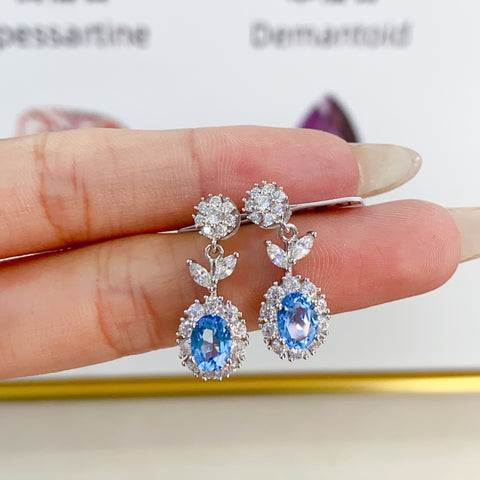 Anting Topaz Alami yang terbuat dari perak 925, ditata dengan indah, dengan berat sekitar 3,55 gram, sekitar 0,9 karat, sudah termasuk ongkos kirim dan paja