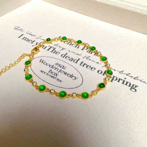 Gelang Jadeite Alami yang terbuat dari perak 925. Gioknya bagus dan hangat, gayanya indah, sudah termasuk pajak pengiriman.