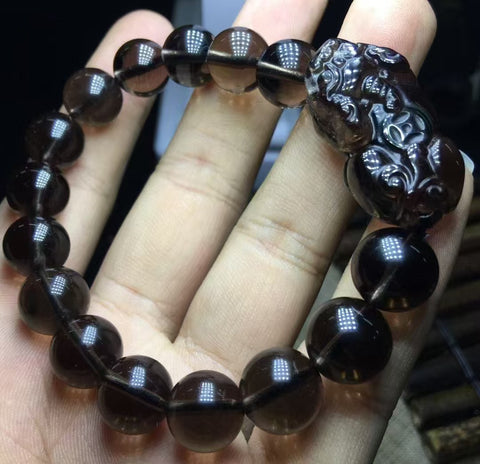 Gelang Gelang Berani Obsidian Hitam Es Alami Ukuran 12mm Tekstur berminyak dan warna lembut Es Bening Sudah termasuk pajak pengiriman.