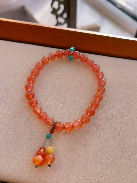 Gelang Labu Merah Alami Ukuran 6.5mm Tekstur keras Warna cerah Sudah termasuk pajak pengiriman.