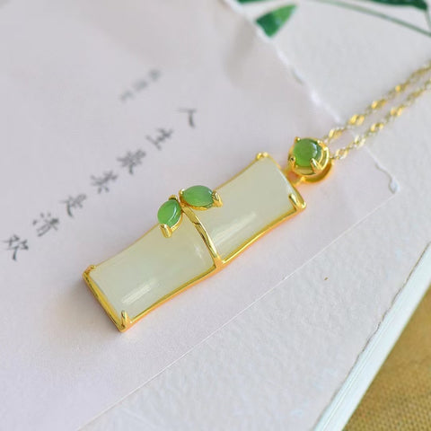 Kalung Bambu Giok Hetian Giok Alami Ukuran 9 * 30mm & 925 Giok Tatahan Perak bersih dan halus serta hangat Sudah termasuk pajak pengiriman.
