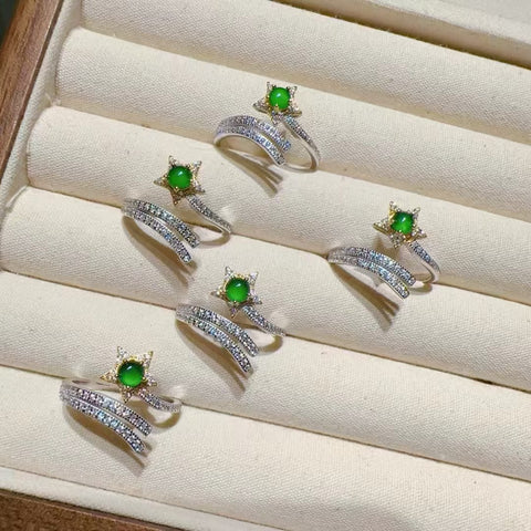 Cincin Bintang Giok Guatemala alami yang terbuat dari perak 925. Gioknya bersih, halus, dan hangat. Gayanya indah dan modis, cocok untuk segala acara. Sudah termasuk ongkos kirim dan pajak.
