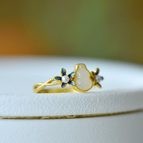 9542-2# Cincin labu dan anggrek giok Hetian bertatahkan perak 925. Dimensi giok: 5*7 mm. Gratis ongkos kirim dan pajak.