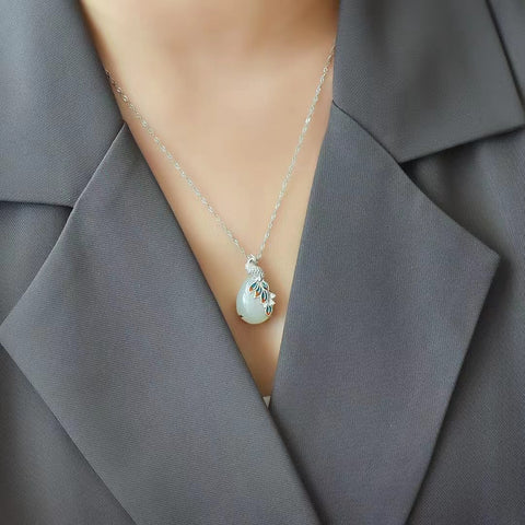 Kalung Hetian Jade Phoenix alami yang terbuat dari perak 925, giok halus dan hangat, gaya baru, sudah termasuk pajak pengiriman.