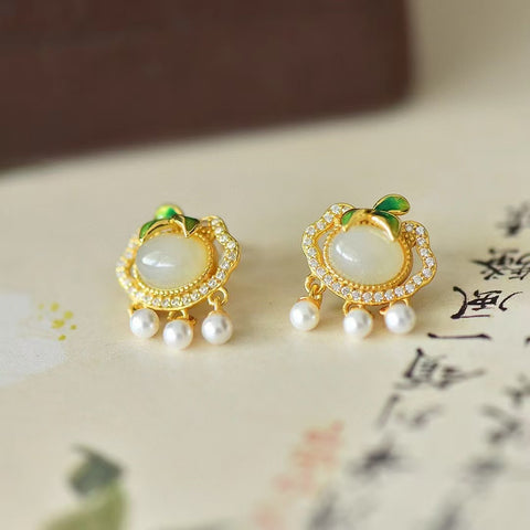 2786-2 Daun Bambu Giok Hetian Alami dan Anting Awan Keberuntungan Set dalam 925 Perak Ukuran 6 * 8mm Giok bersih, halus dan hangat, dan gayanya baru dan unik. Pengiriman dan pajak sudah termasuk.