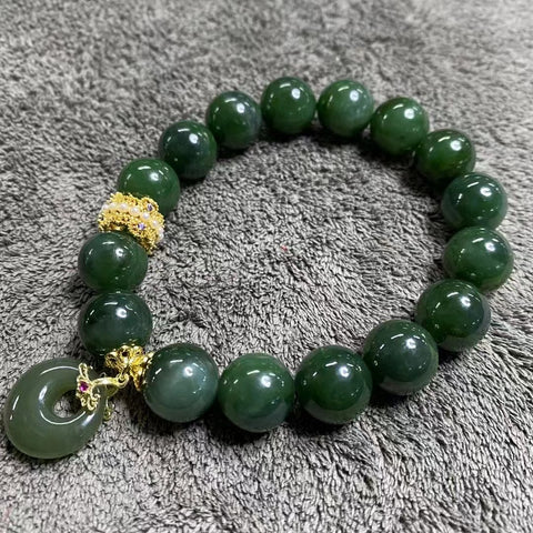 Gelang Jasper Halus dengan Titik Tinta Alami Ukuran 12mm Sudah termasuk pajak pengiriman.