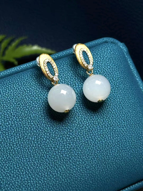 Anting giok Hetian Qingshui "sempurna" berbentuk bulat dan penuh dengan keanggunan oriental ~ tatahan perak 925 yang disikat. Ukuran: sekitar 12mm, batu alam terbentuk secara alami, polanya acak. Bebas biaya kirim dan pajak