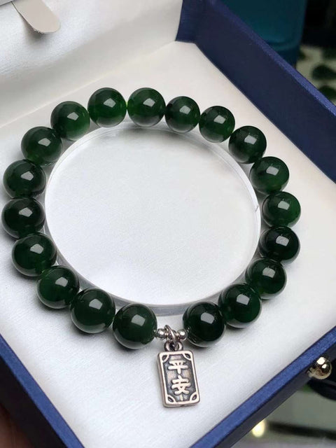 Gelang hotan giok jasper bayam hijau, montok, bulat dan kaya warna 🎉Artinya bergulir dalam kekayaan. Modis dan serbaguna. Dipasangkan dengan aksesoris perak 925. Ukuran: 10mm. Sudah termasuk ongkos kirim dan pajak