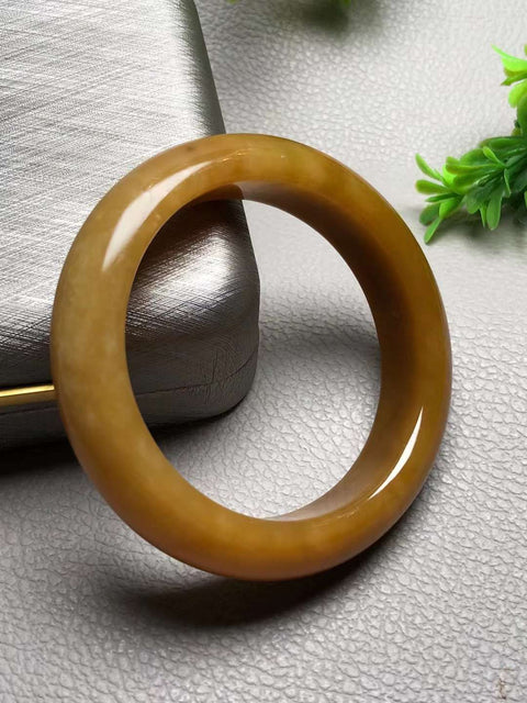 Giok Xiu Jade Alami Laokeng Bunga Giok "Gelang Warna Gula" Warna toffee alami, lembut dan lembap, mewah dan berkelas untuk dipakai Ukuran: 57×15㎜. Gratis ongkir dan pajak. Giok item semuanya dihasilkan secara alami dengan pola acak