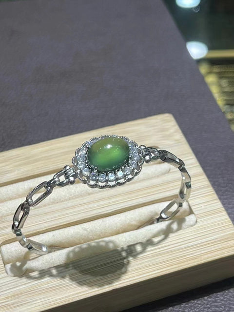 Gelang Giok Alami 925 bertatahkan perak Ukuran 13,5 * 10mm Giok gaya yang bagus, bersih, halus dan hangat.