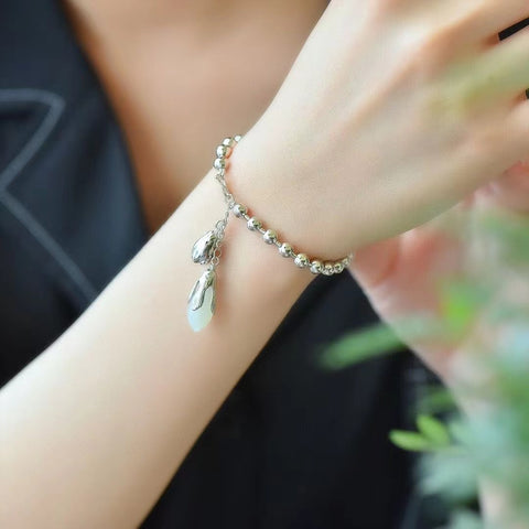 8026 Gelang Bunga Magnolia Giok Hetian Giok Alami Set dalam 925 Perak Ukuran 9 * 16mm Gaya yang bagus dan giok yang bersih.