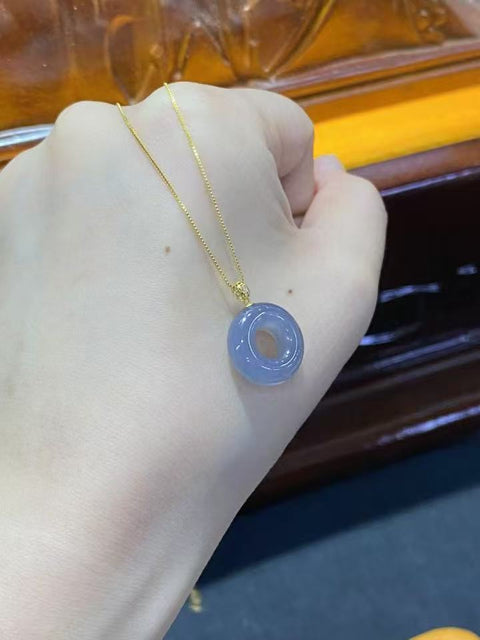 Kalung Donat Ungu Smokey Jade Hotan Alami Ukuran 15mm Rantai Perak GRATIS Set Emas 18k Sudah termasuk pajak pengiriman.