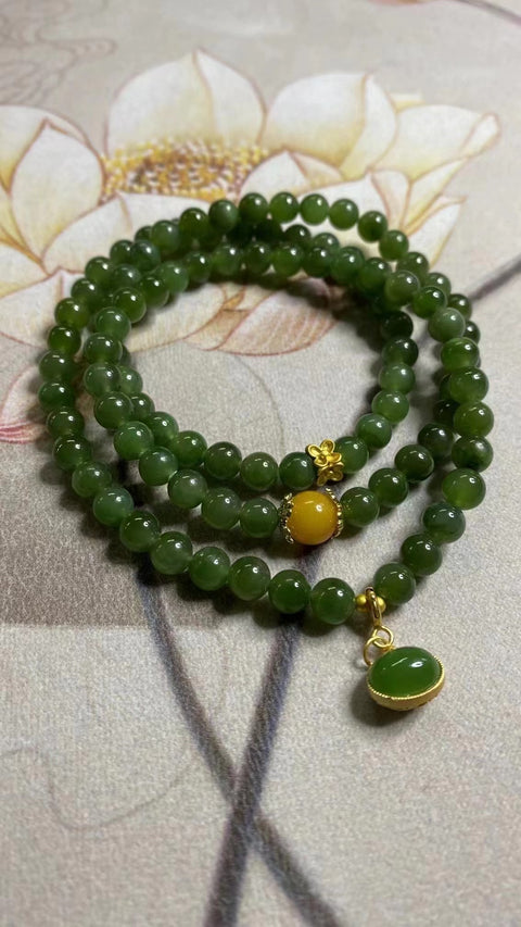 Untaian Giok Hetian Alami Warna Pirus Ukuran 6mm Dengan aksesoris yang indah Batu giok ini bersih, halus dan hangat Sudah termasuk pajak pengiriman.