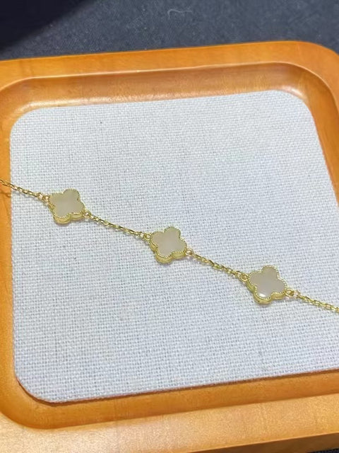 Set Gelang Semanggi Empat Daun Giok Hetian Giok Alami dari 925 Perak Panjang yang dapat disesuaikan Giok yang halus dan hangat Sudah termasuk pajak pengiriman.