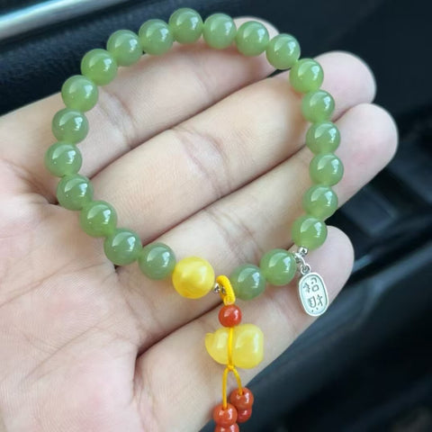 Gelang Giok Hetian Alami Warna hijau kekuningan Kualitas sempurna Ukuran 8mm Giok halus dan hangat Gaya yang indah sudah termasuk pajak pengiriman.