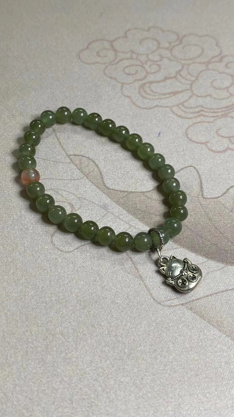 Gelang Giok Hetian Alami dengan aksesoris cantik Ukuran 6.2mm Giok bersih, halus dan hangat Sudah termasuk ongkos kirim dan pajak.