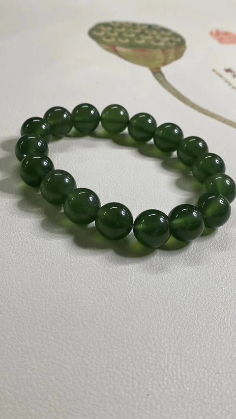 Untaian Giok Peopeo Alami Ukuran 12mm Giok bersih, halus dan hangat Termasuk ongkos kirim dan pajak.