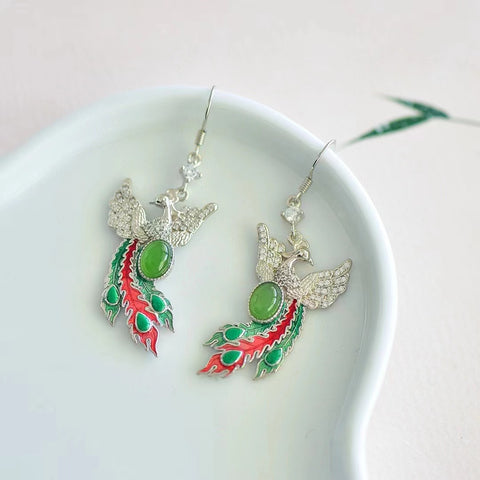 12359 Anting-anting Giok Hetian Jade Phoenix Alami yang terbuat dari perak 925, gioknya bersih, halus dan hangat, serta gayanya yang baru dan apik. Sudah termasuk ongkos kirim dan pajak.