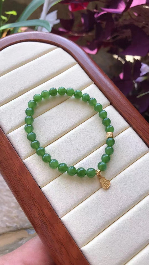 Gelang Desain Jasper Alami Ukuran 6mm dengan aksesoris perak berwarna 925. Batu giok yang bersih, halus, dan hangat Sudah termasuk pajak pengiriman.