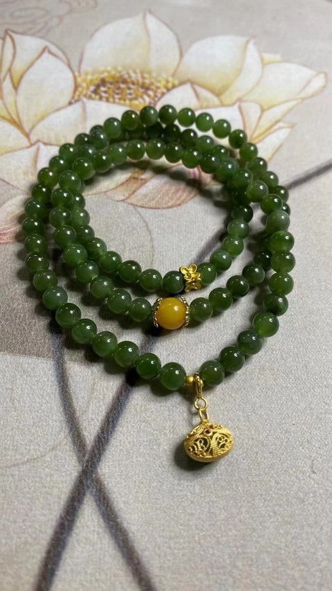 Untaian Giok Hetian Alami Warna Pirus Ukuran 6mm Dengan aksesoris yang indah Batu giok ini bersih, halus dan hangat Sudah termasuk pajak pengiriman.