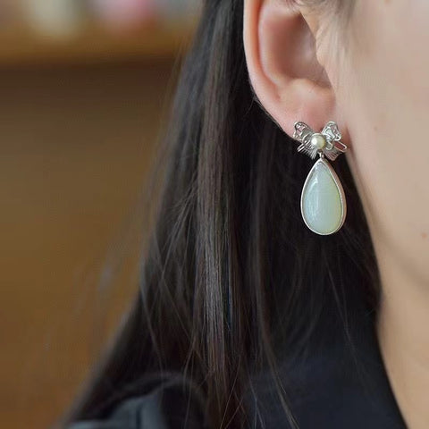 7754 Anting Busur Giok Giok Hetian Alami yang terbuat dari 925 perak; Ukuran 10 * 18mm; Gaya yang unik; Jumlah sudah termasuk pajak pengiriman.