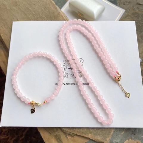 Set Giok Giok Hetian Alami Akar Teratai Merah Muda Giok halus dan hangat dengan warna-warna yang indah Ukuran 6mm Pengiriman dan pajak sudah termasuk.