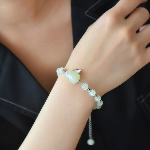8808 Gelang Kelinci Giok Hetian Alami 925 Tatahan Perak Ukuran 13 * 18mm Gaya yang bagus dan giok yang bersih.