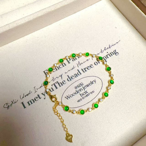 Gelang Jadeite Alami yang terbuat dari perak 925. Gioknya bagus dan hangat, gayanya indah, sudah termasuk pajak pengiriman.