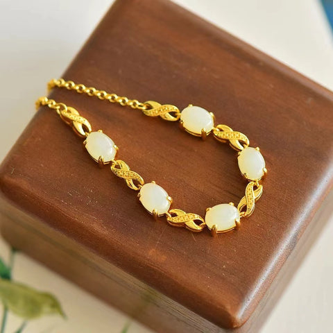 Gelang Giok Hetian Giok alami yang bersih dan halus, terbuat dari perak 925, gaya baru, ukuran 6 * 8mm, termasuk pajak pengiriman.